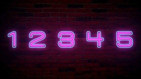 Image of Glowing neon number (1, 2, 3, 4, 5) signs on brick wall