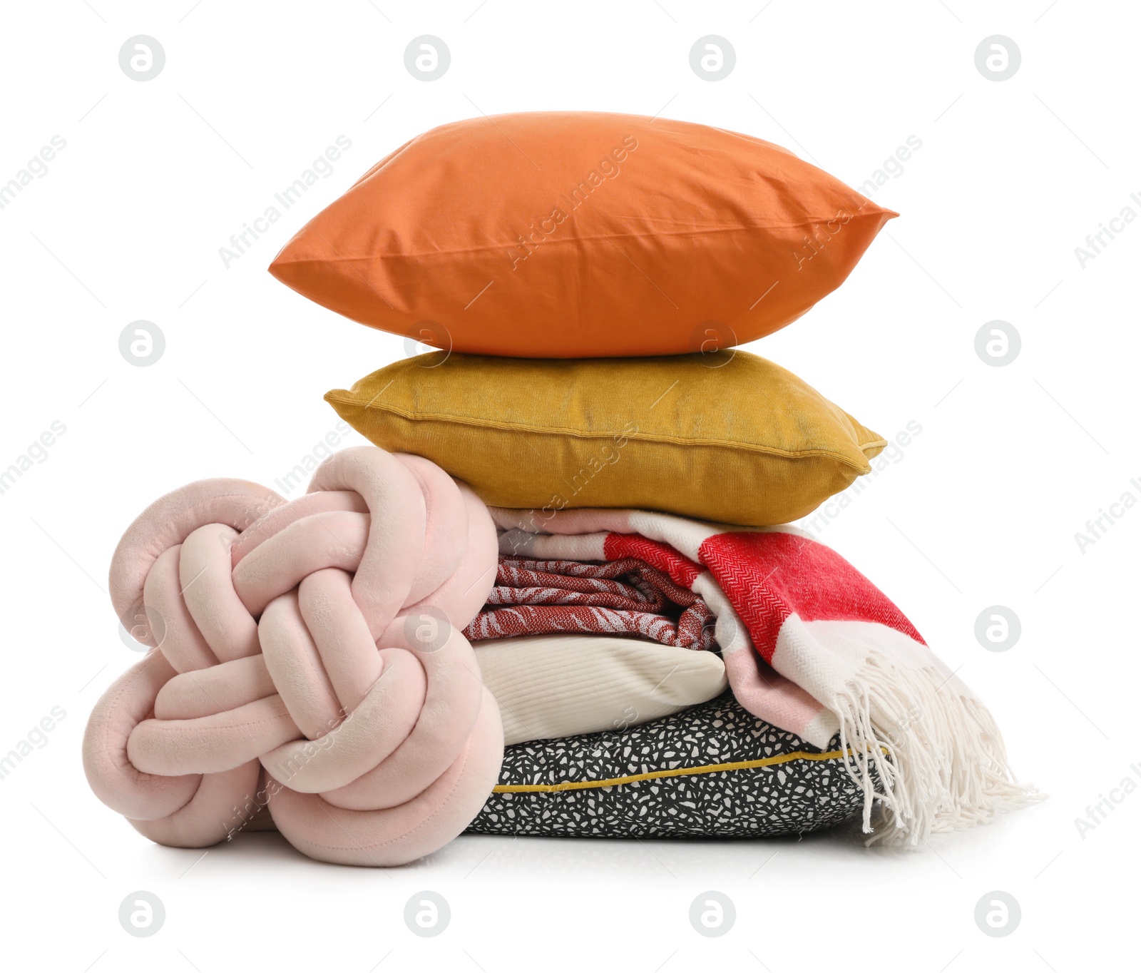 Photo of Stylish soft pillows and blankets on white background