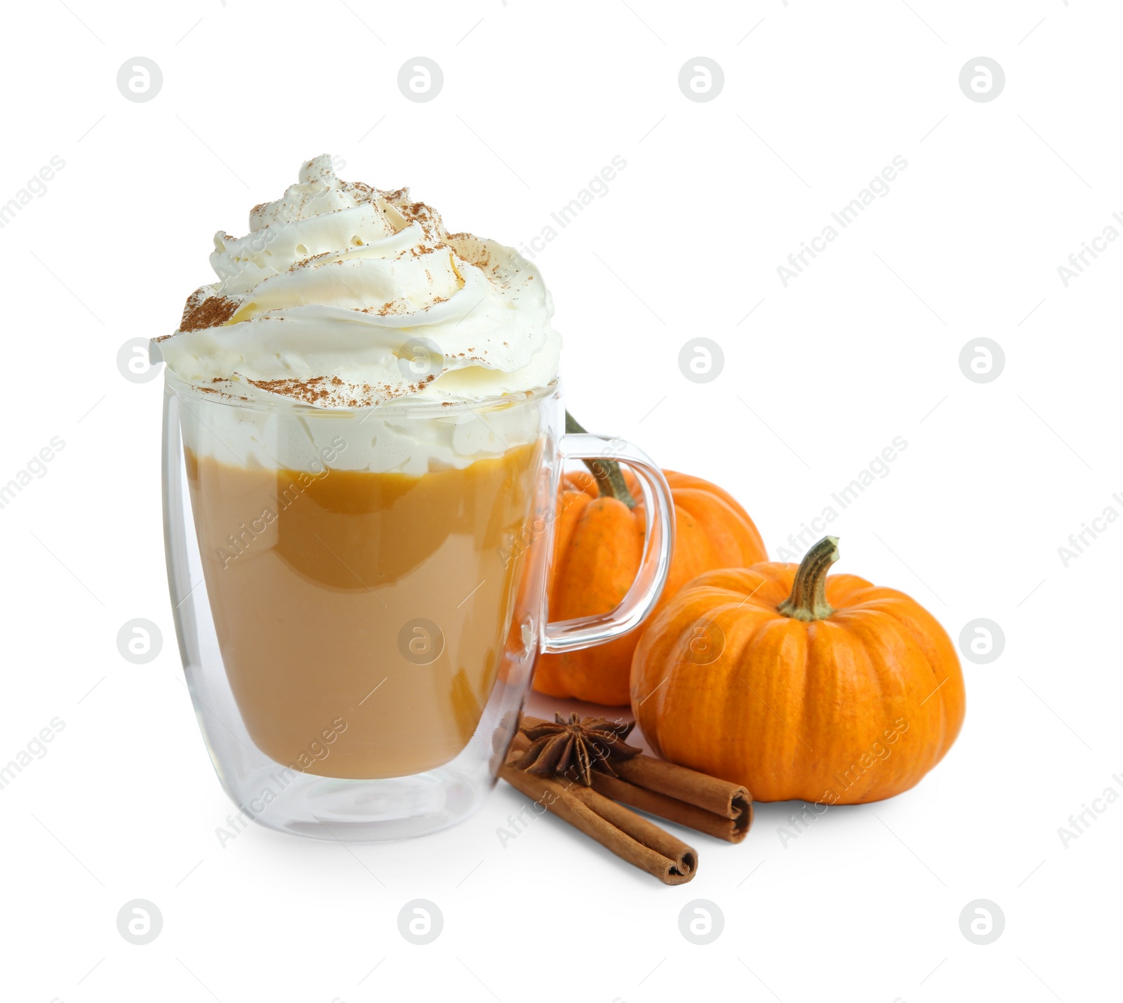 Photo of Cup of pumpkin spice latte with whipped cream, squashes and cinnamon sticks isolated on white