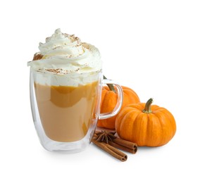 Photo of Cup of pumpkin spice latte with whipped cream, squashes and cinnamon sticks isolated on white