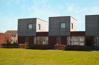 Block of houses on sunny day. Suburban district