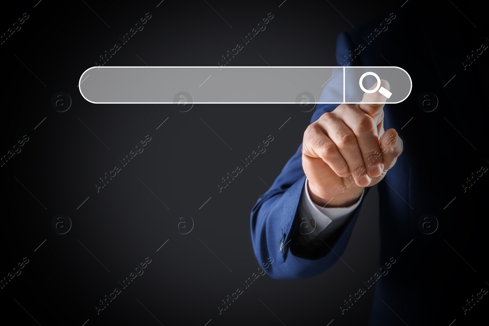 Image of Man pointing at search bar on virtual screen against dark background, closeup