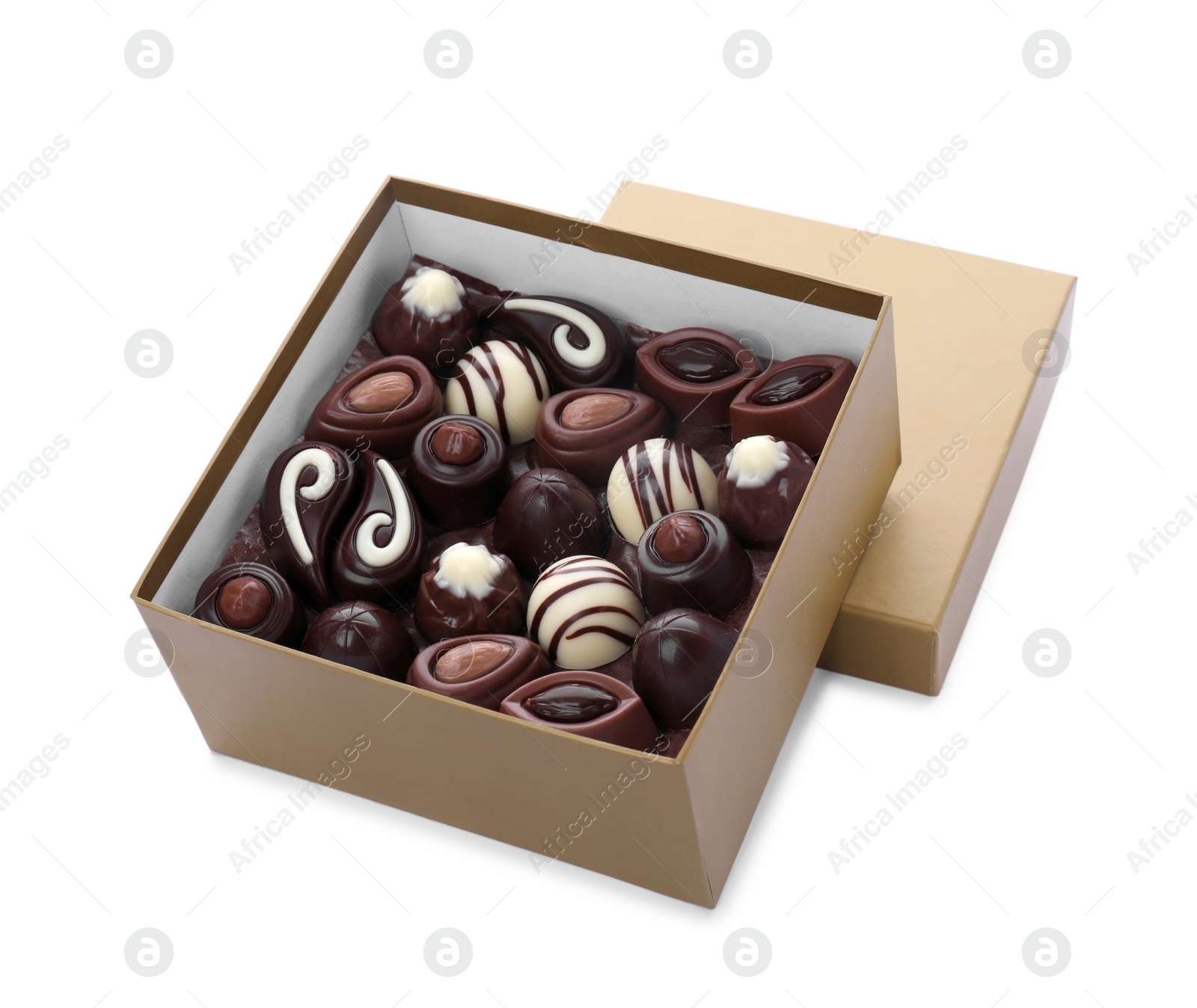 Photo of Box of delicious chocolate candies isolated on white