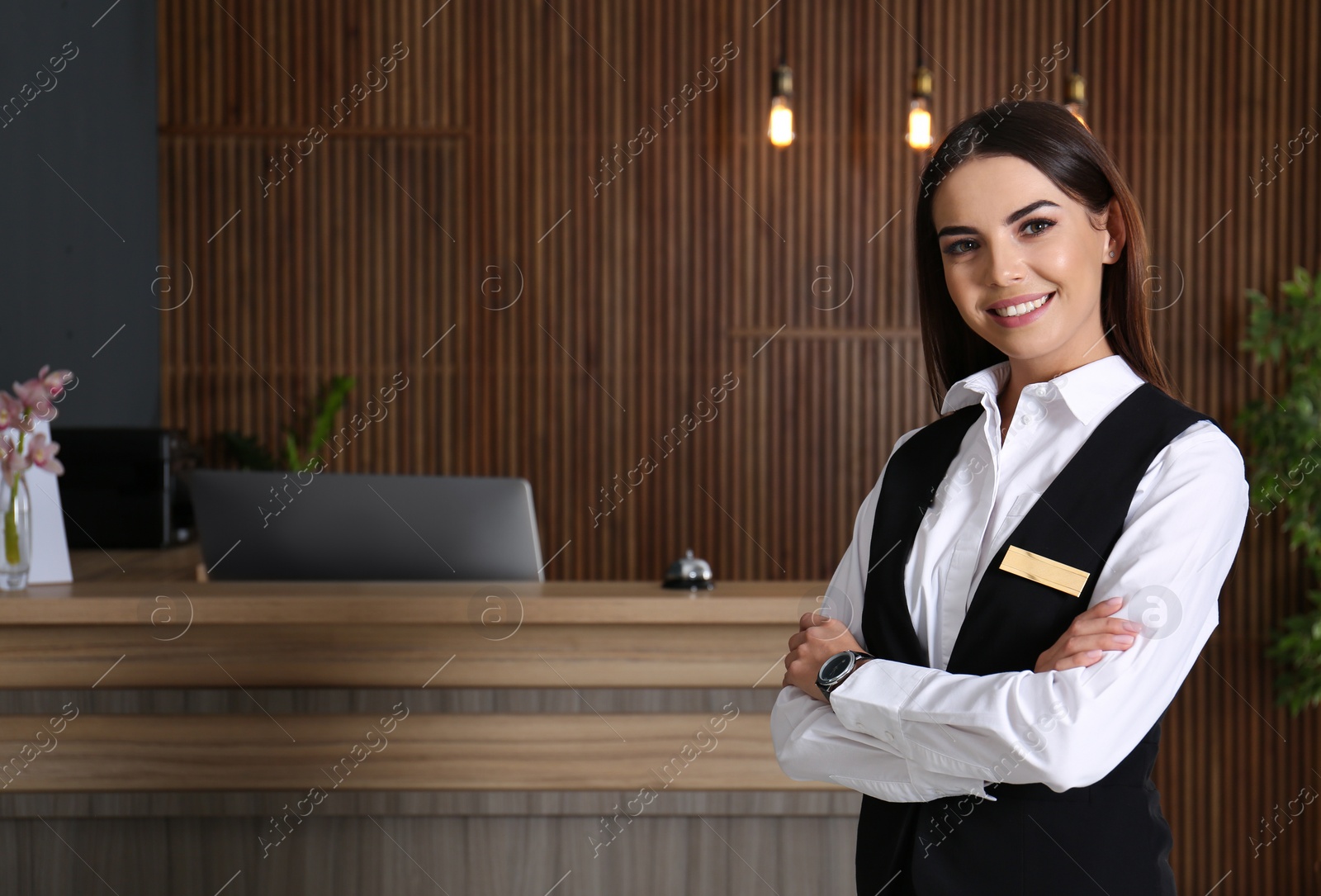 Photo of Portrait of receptionist at desk in lobby
