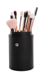 Photo of Leather holder with professional makeup brushes on white background