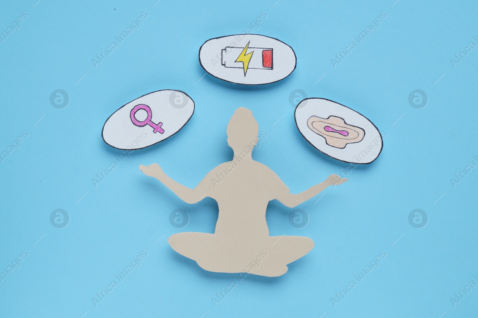 Photo of Woman's health. Female paper figure and different symbols on light blue background, flat lay