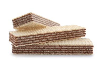 Delicious wafer sticks with chocolate filling isolated on white