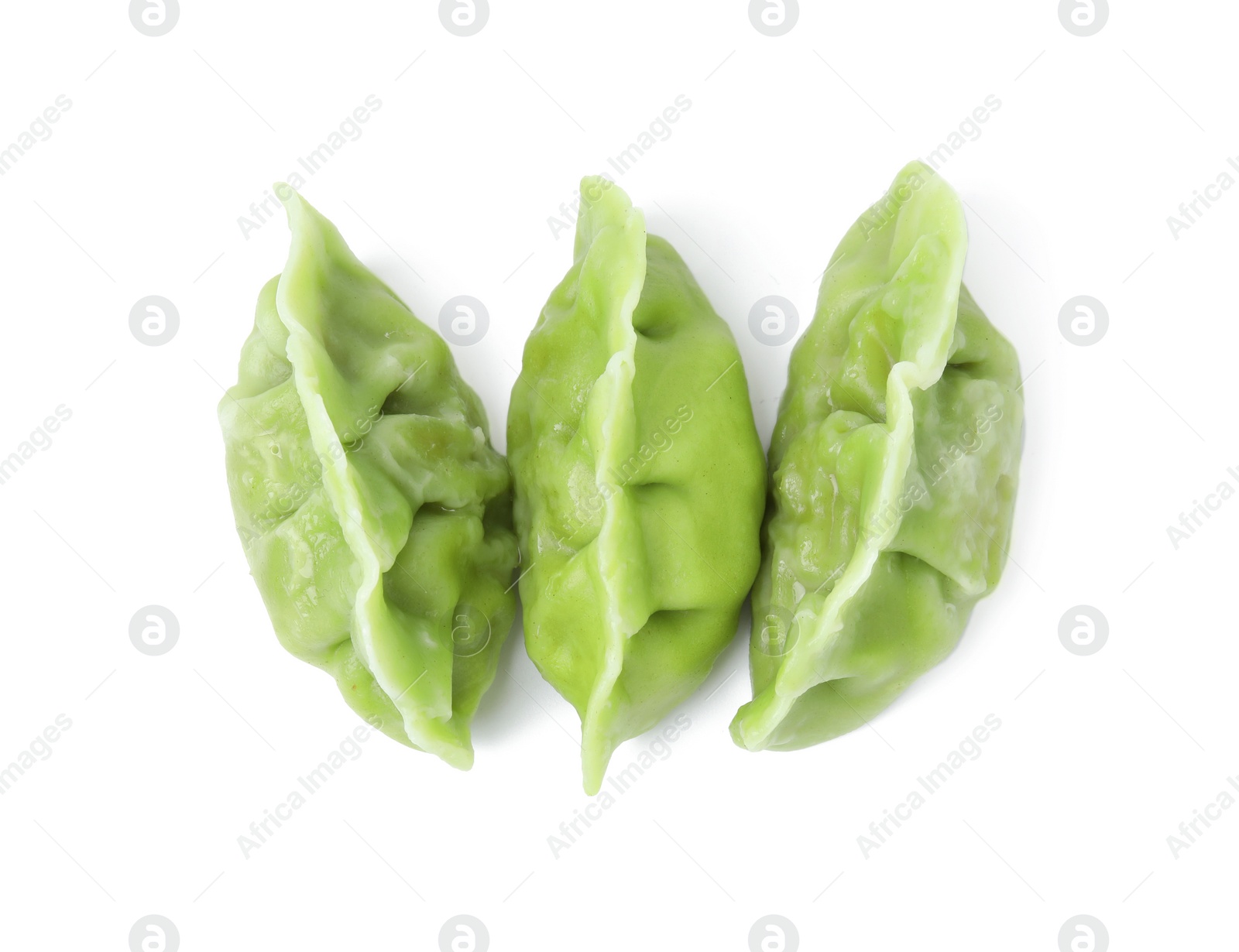 Photo of Delicious green dumplings (gyozas) isolated on white, top view