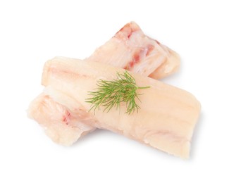 Photo of Pieces of raw cod fish and dill isolated on white