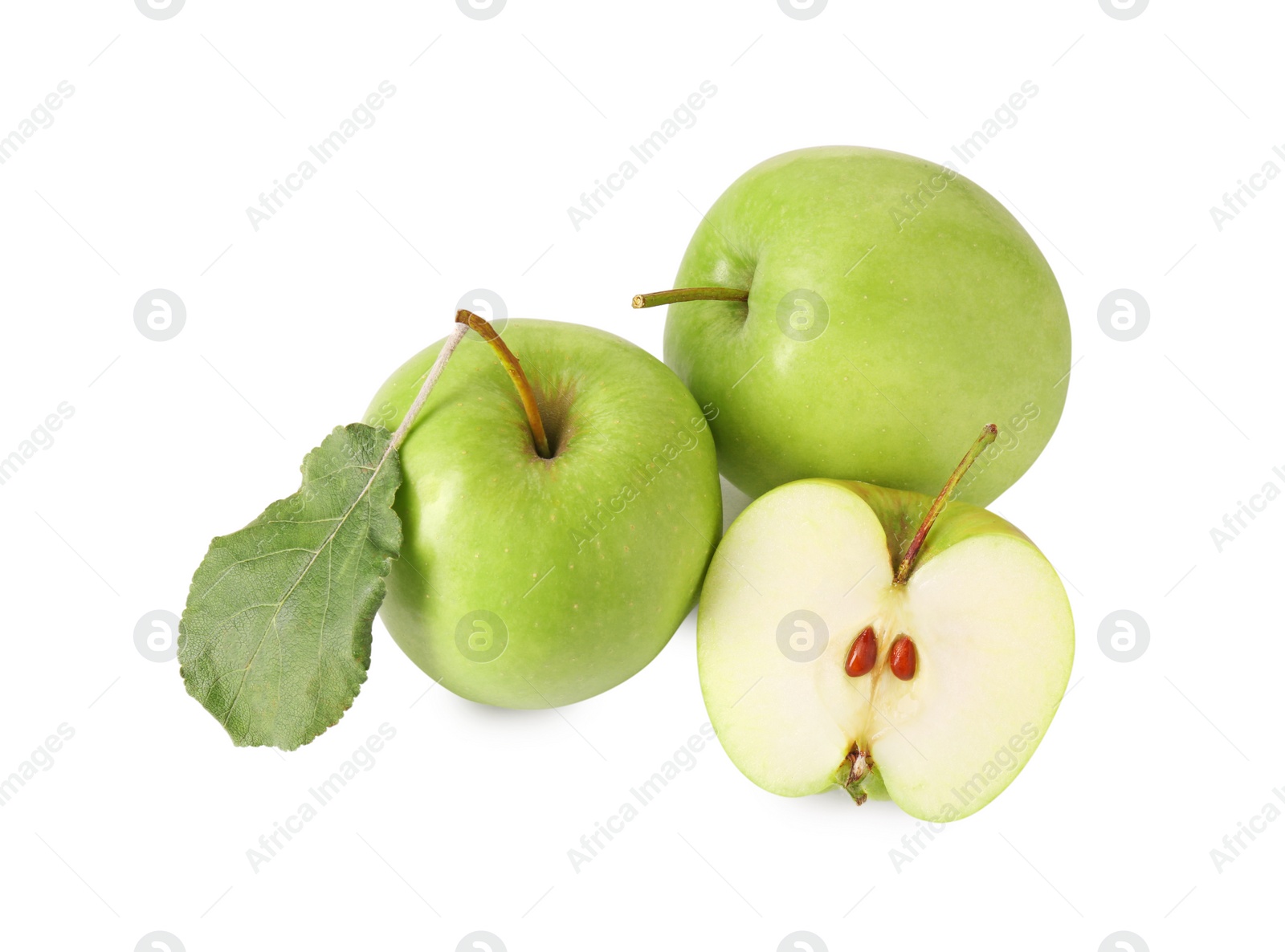 Photo of Whole and cut green apples isolated on white