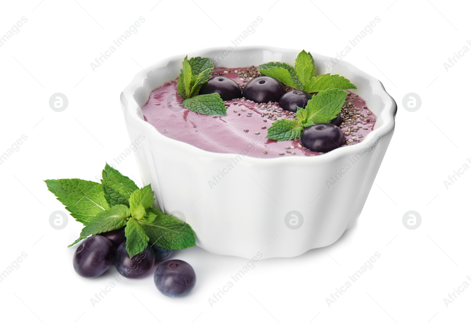 Photo of Bowl with tasty acai smoothie on white background