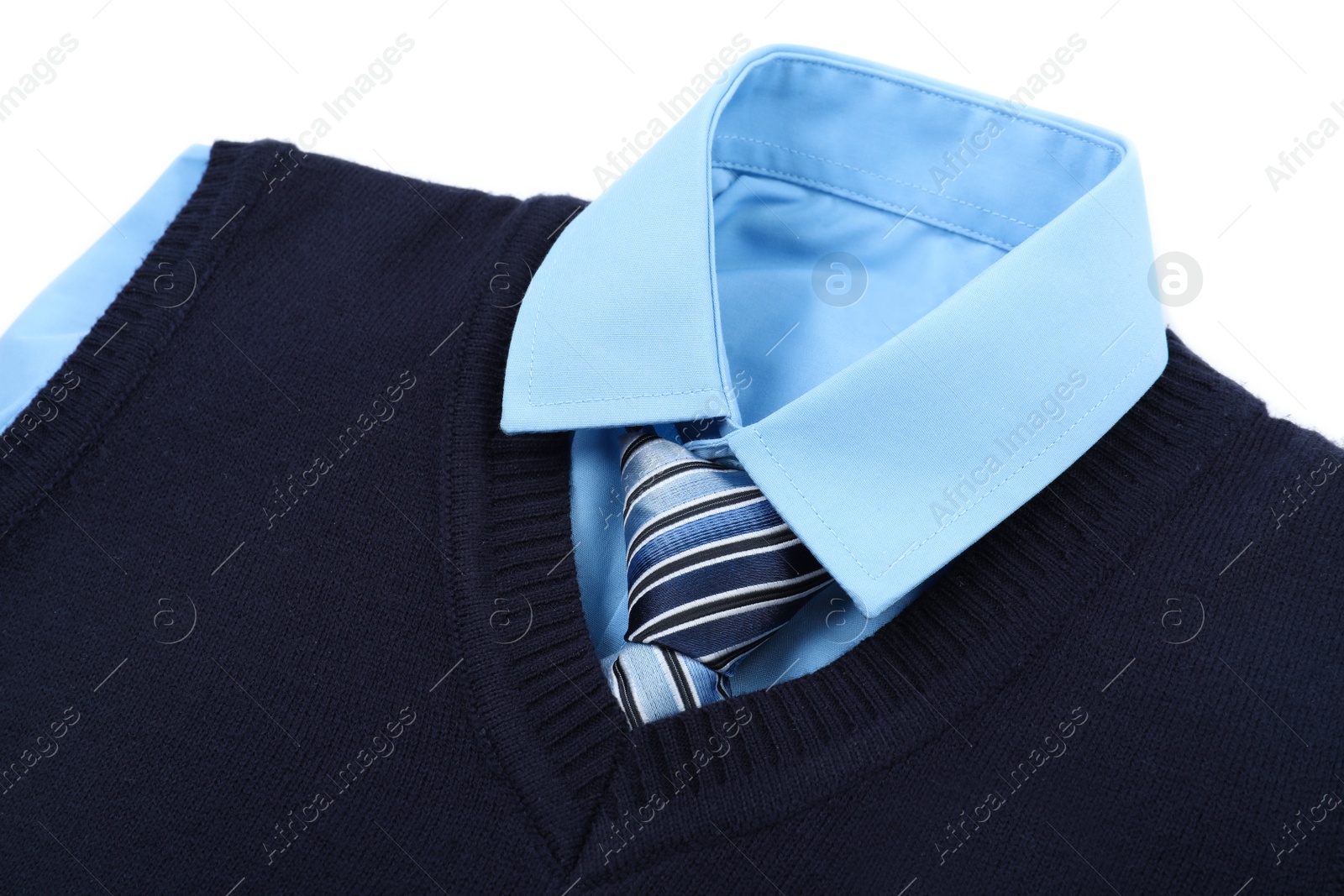 Photo of New stylish school uniform on white background, closeup