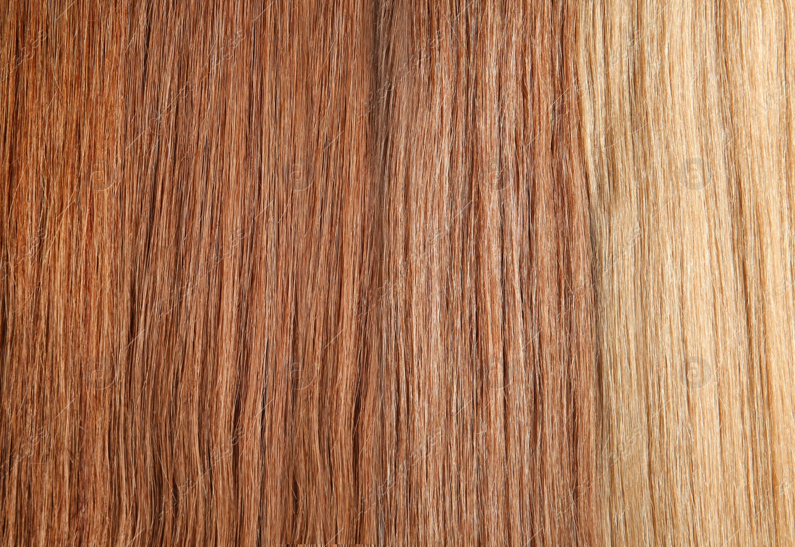 Photo of Strands of different color hair as background, closeup