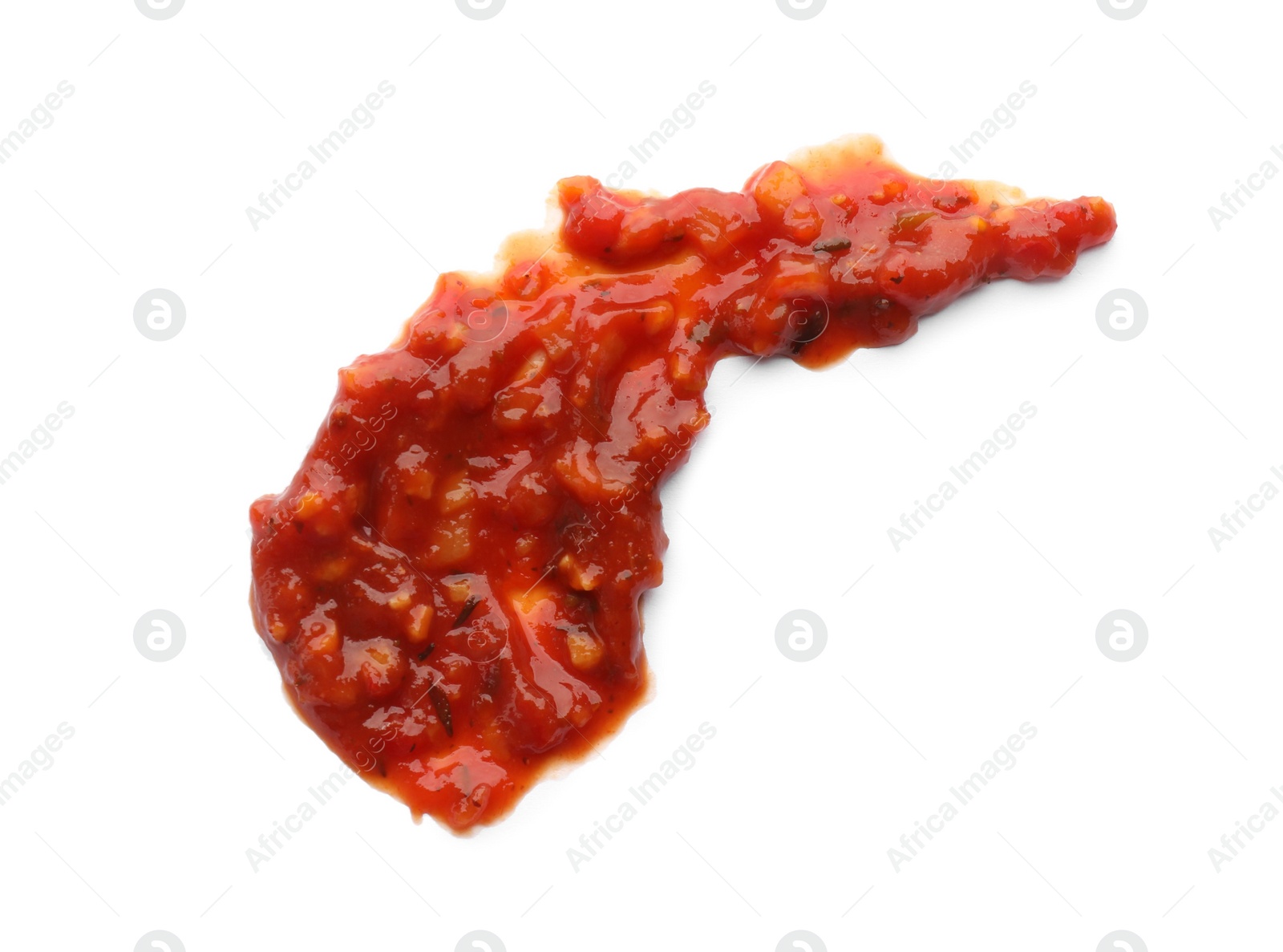 Photo of Smear of delicious adjika sauce isolated on white, top view