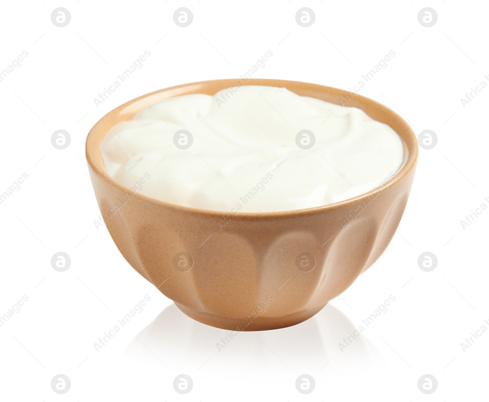 Photo of Bowl with creamy yogurt on white background