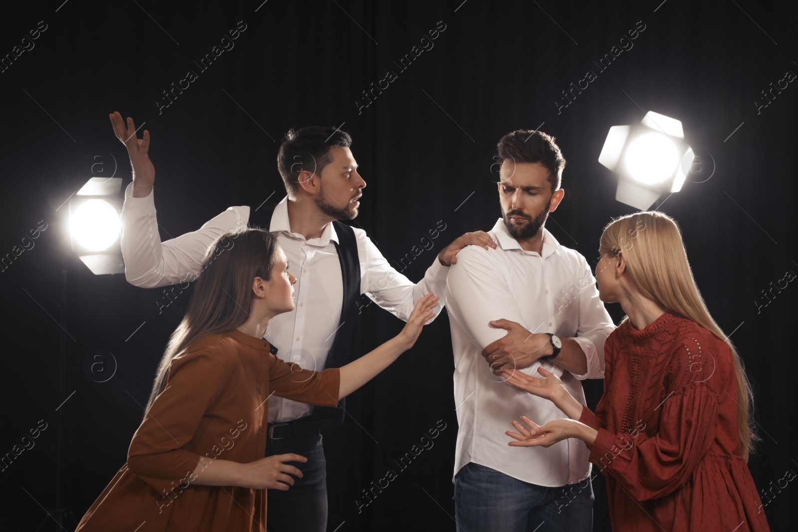 Photo of Professional actors rehearsing on stage in theatre