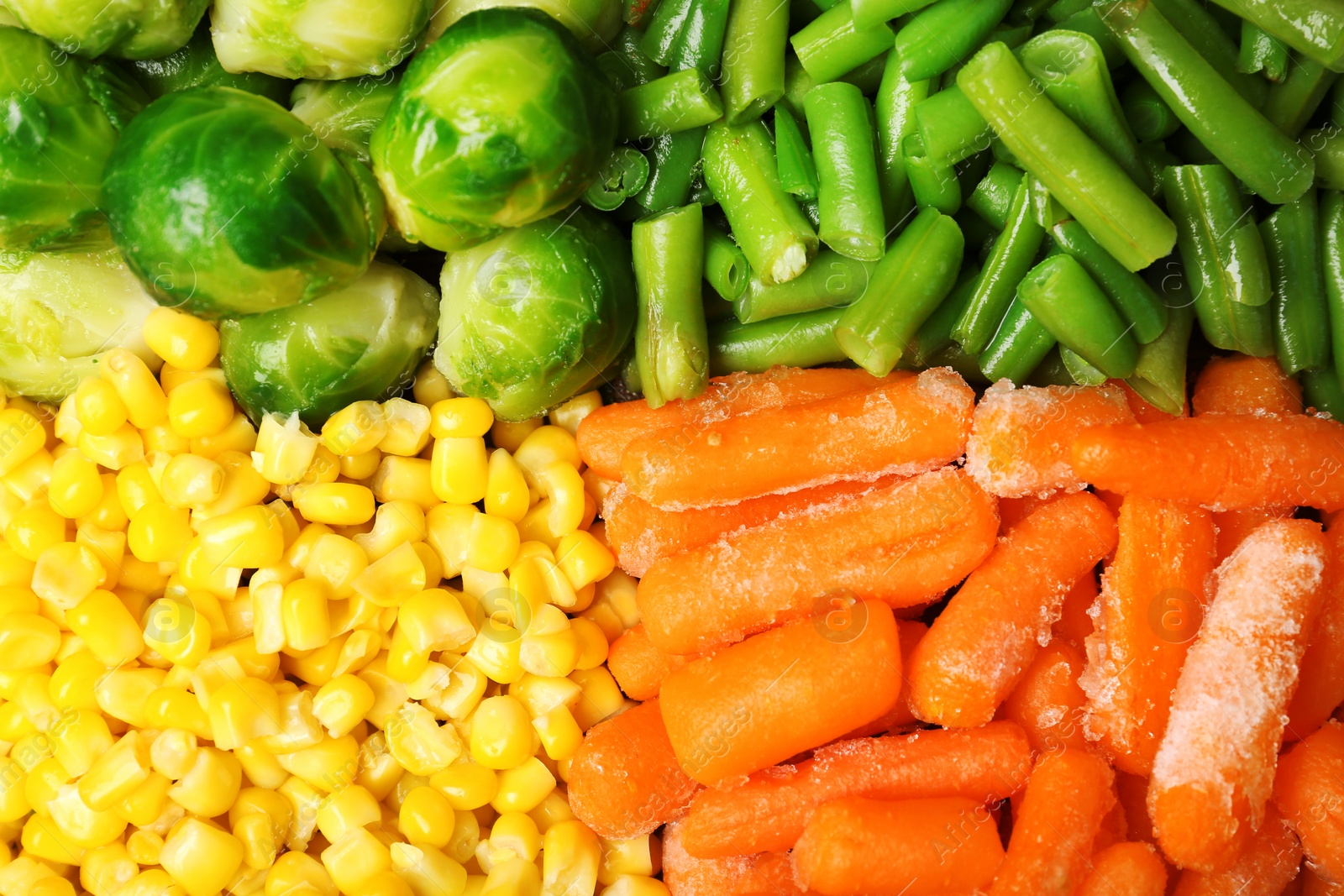 Photo of Mix of frozen vegetables as background, top view