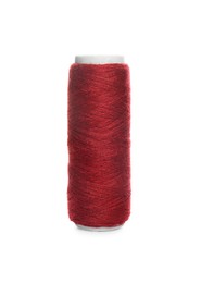 Spool of dark red sewing thread isolated on white