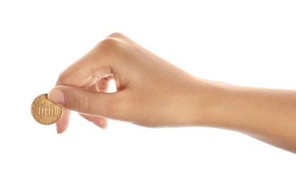 Young woman holding coin isolated on white, closeup