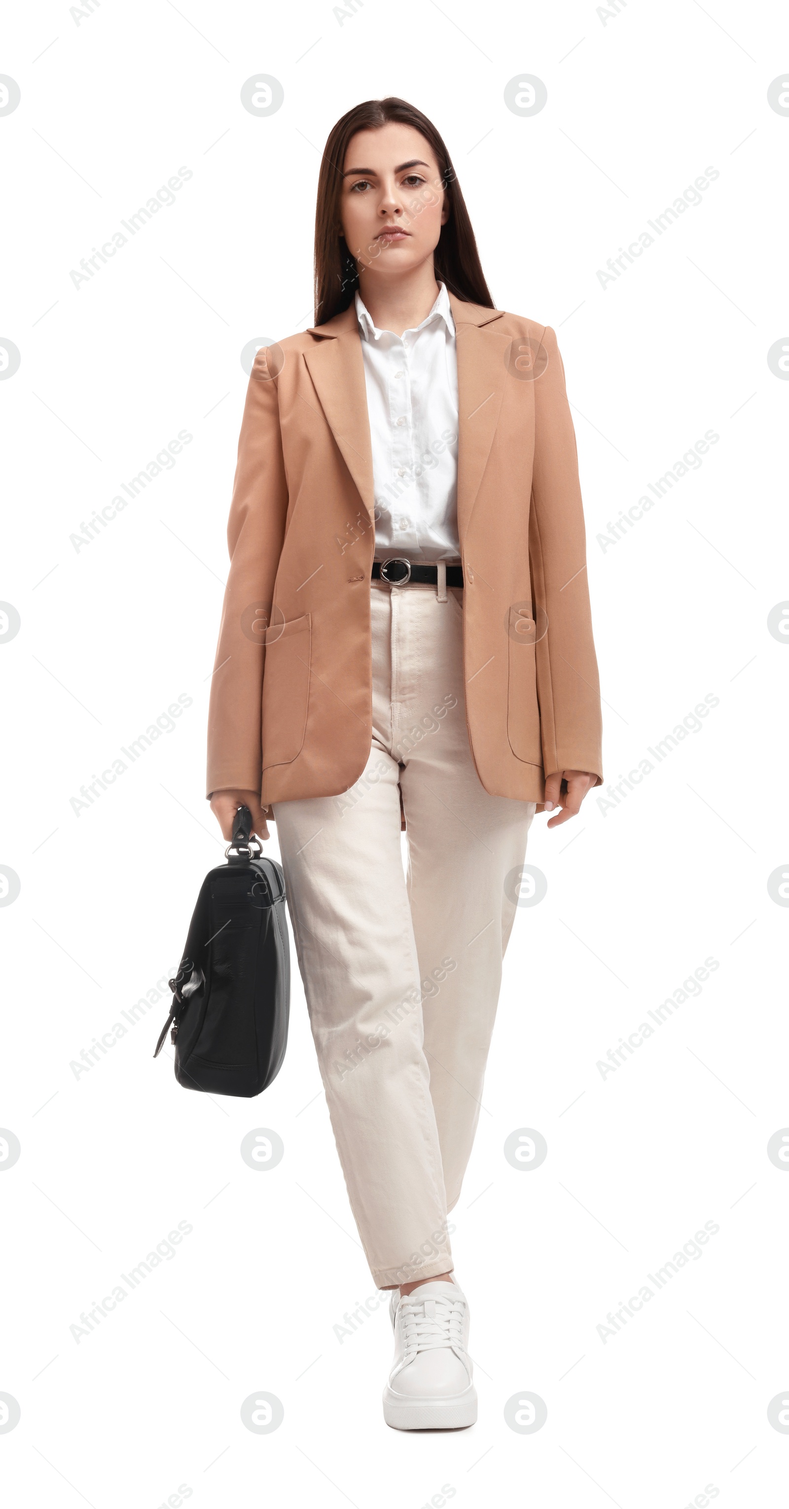 Photo of Beautiful businesswoman with briefcase walking on white background