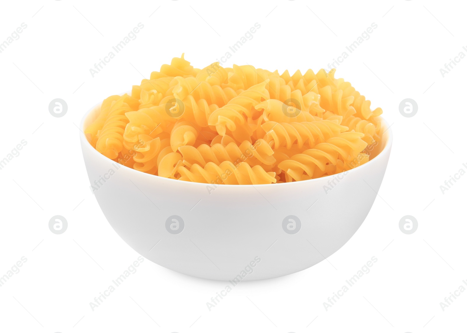 Photo of Raw fusilli pasta in bowl isolated on white