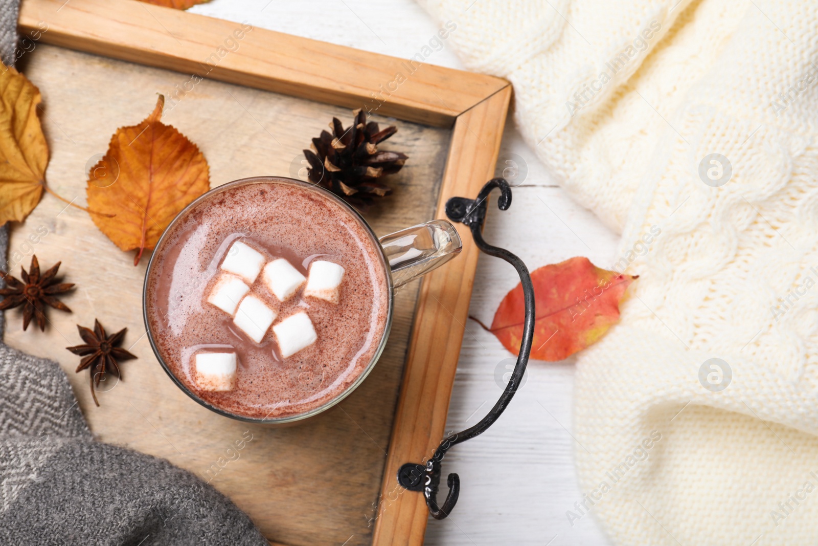 Photo of Flat lay composition with cup of hot drink on white wooden table. Cozy autumn atmosphere