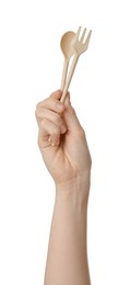 Photo of Woman holding eco friendly cutlery on white background, closeup. Conscious consumption