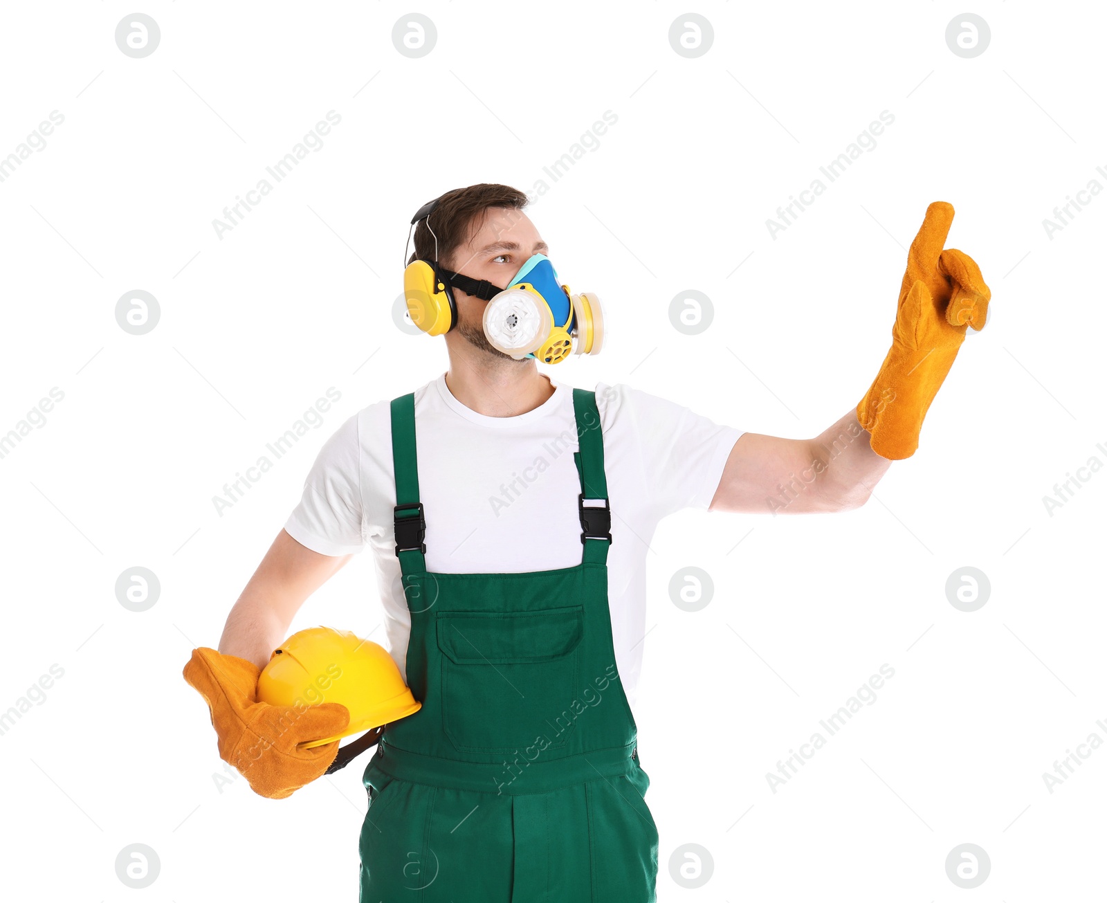 Photo of Male industrial worker in uniform on white background. Safety equipment