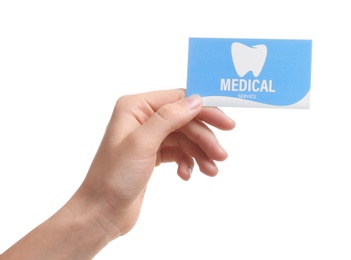 Woman holding business card isolated on white, closeup. Dental medical service