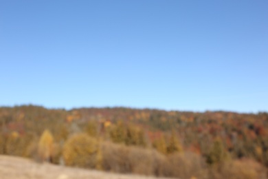 Photo of Picturesque landscape with beautiful forest and mountains, blurred view