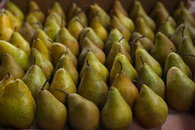 Photo of Sweet tasty fresh pears, closeup. Wholesale market