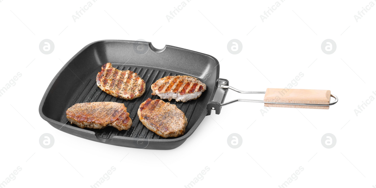 Photo of Grill pan with delicious pork steaks isolated on white