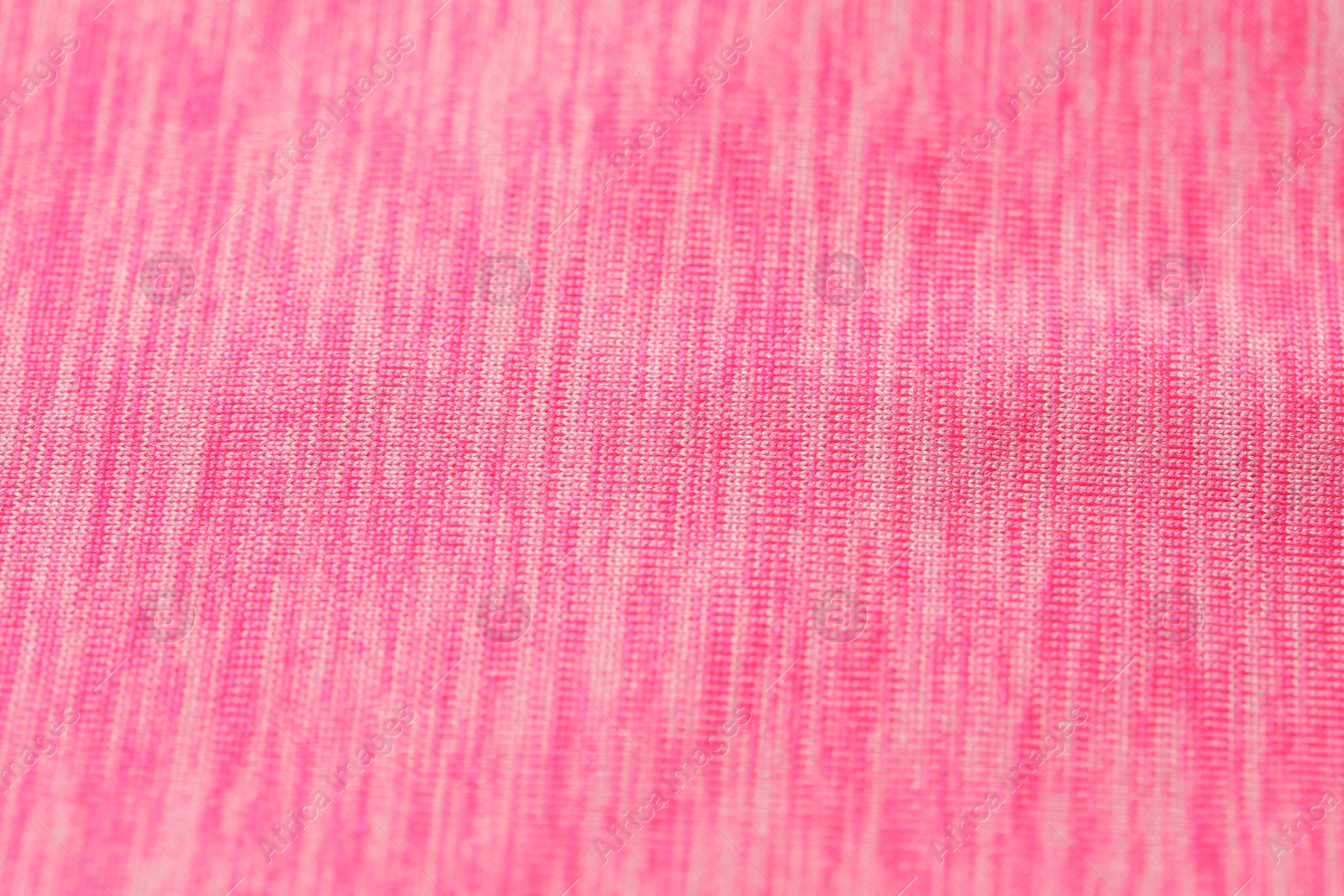 Photo of Texture of soft pink fabric as background, closeup