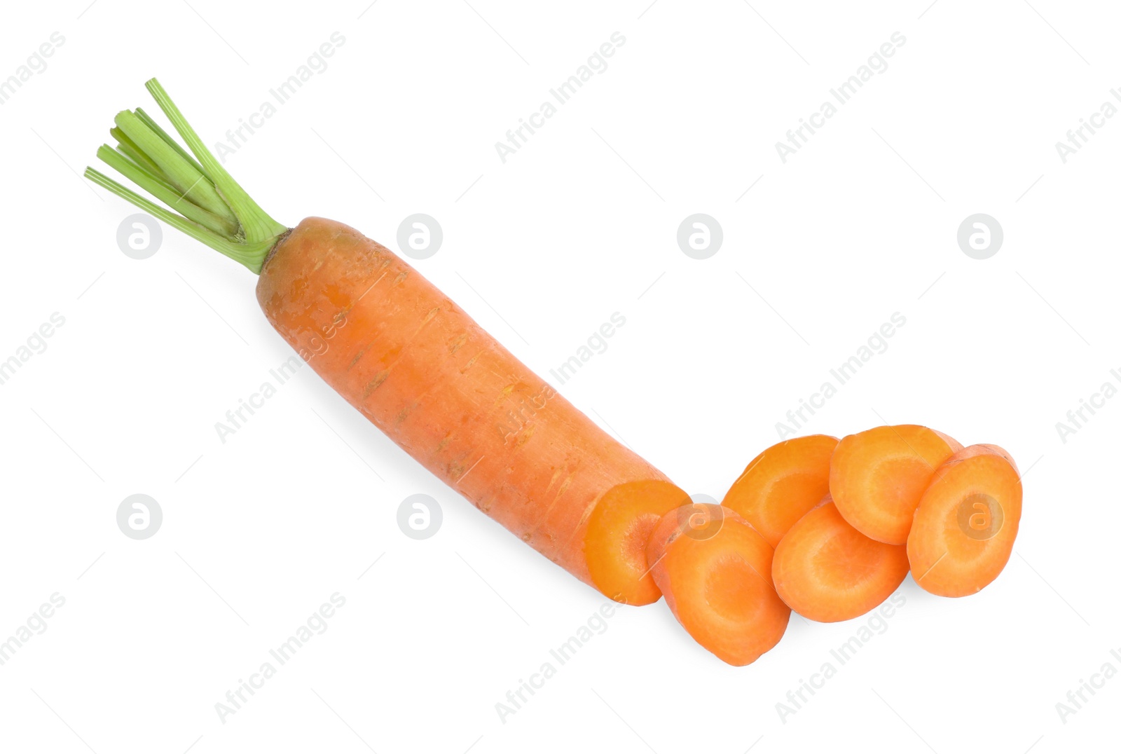 Photo of Tasty ripe organic carrot on white background, top view