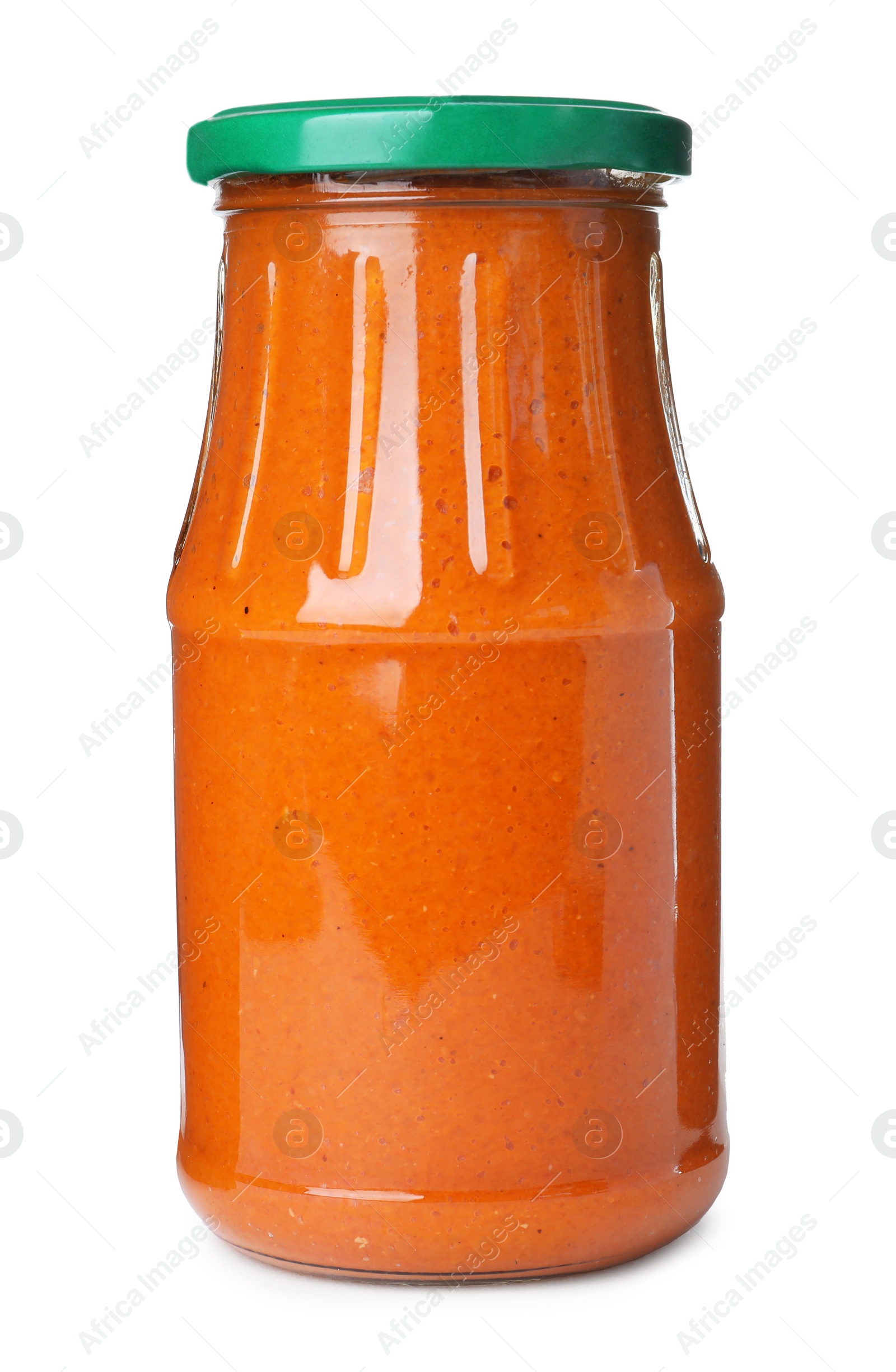 Photo of Glass jar with pickled squash spread isolated on white