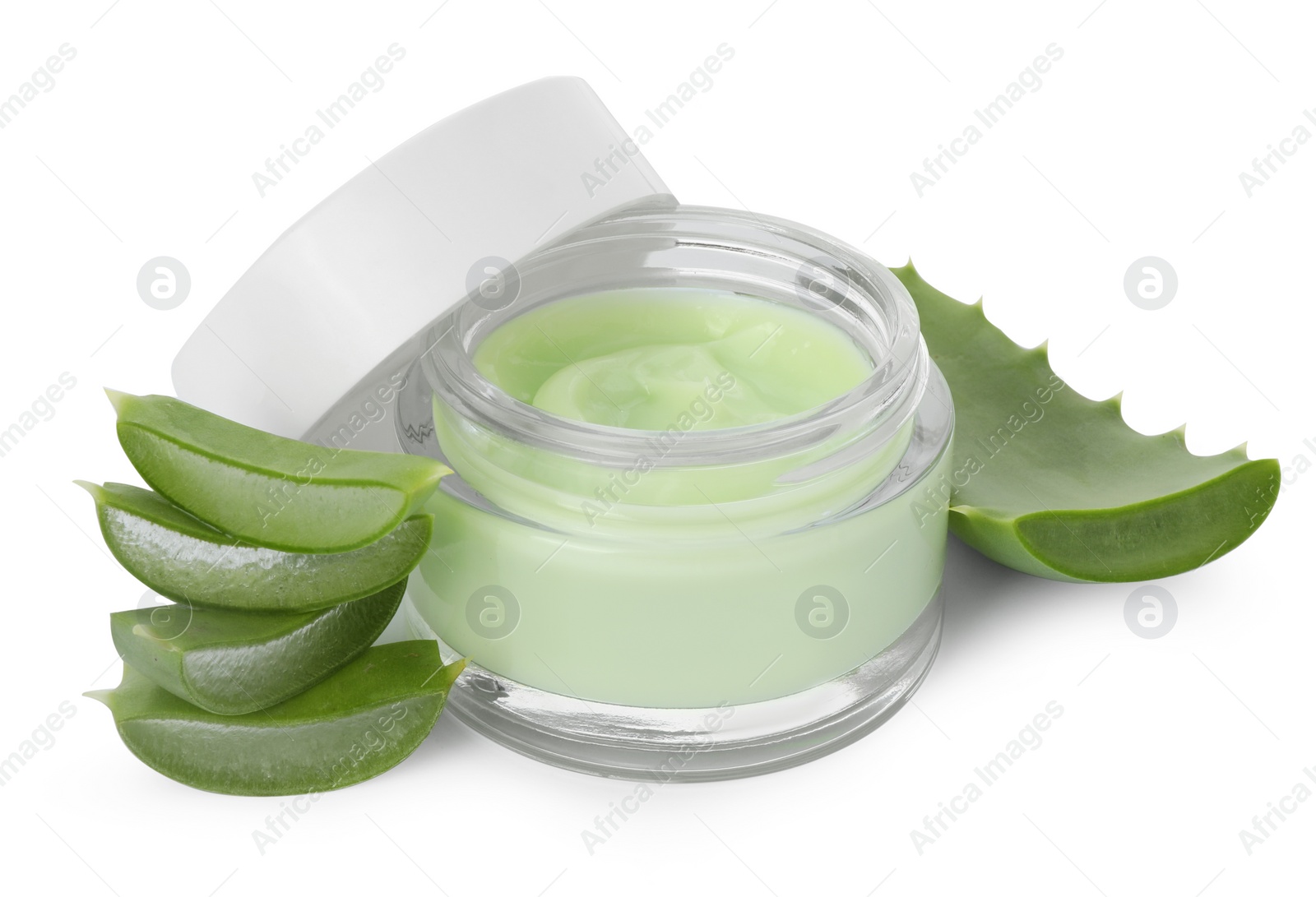 Photo of Jar of natural cream and cut aloe leaves isolated on white