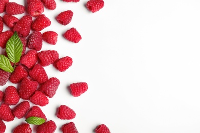 Photo of Composition with delicious ripe raspberries on white background, top view