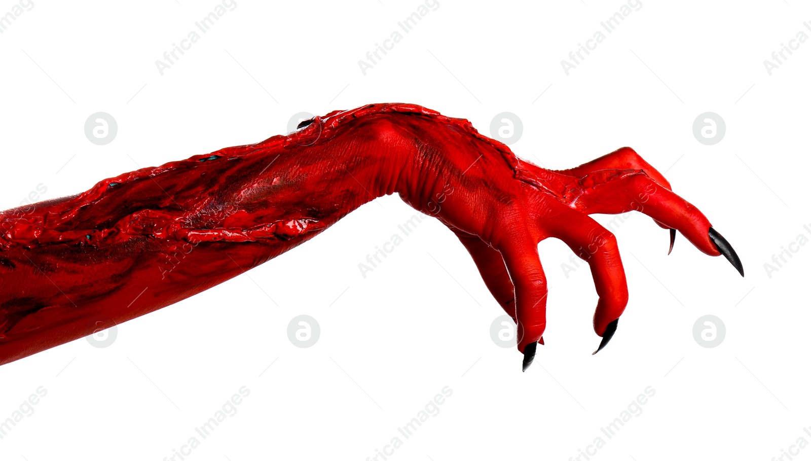 Photo of Scary monster on white background, closeup of hand. Halloween character