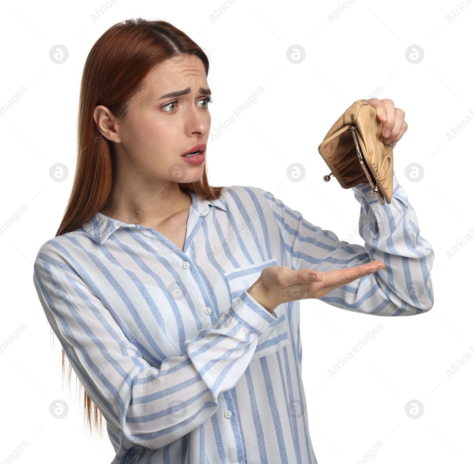 Photo of Upset woman with empty wallet on white background