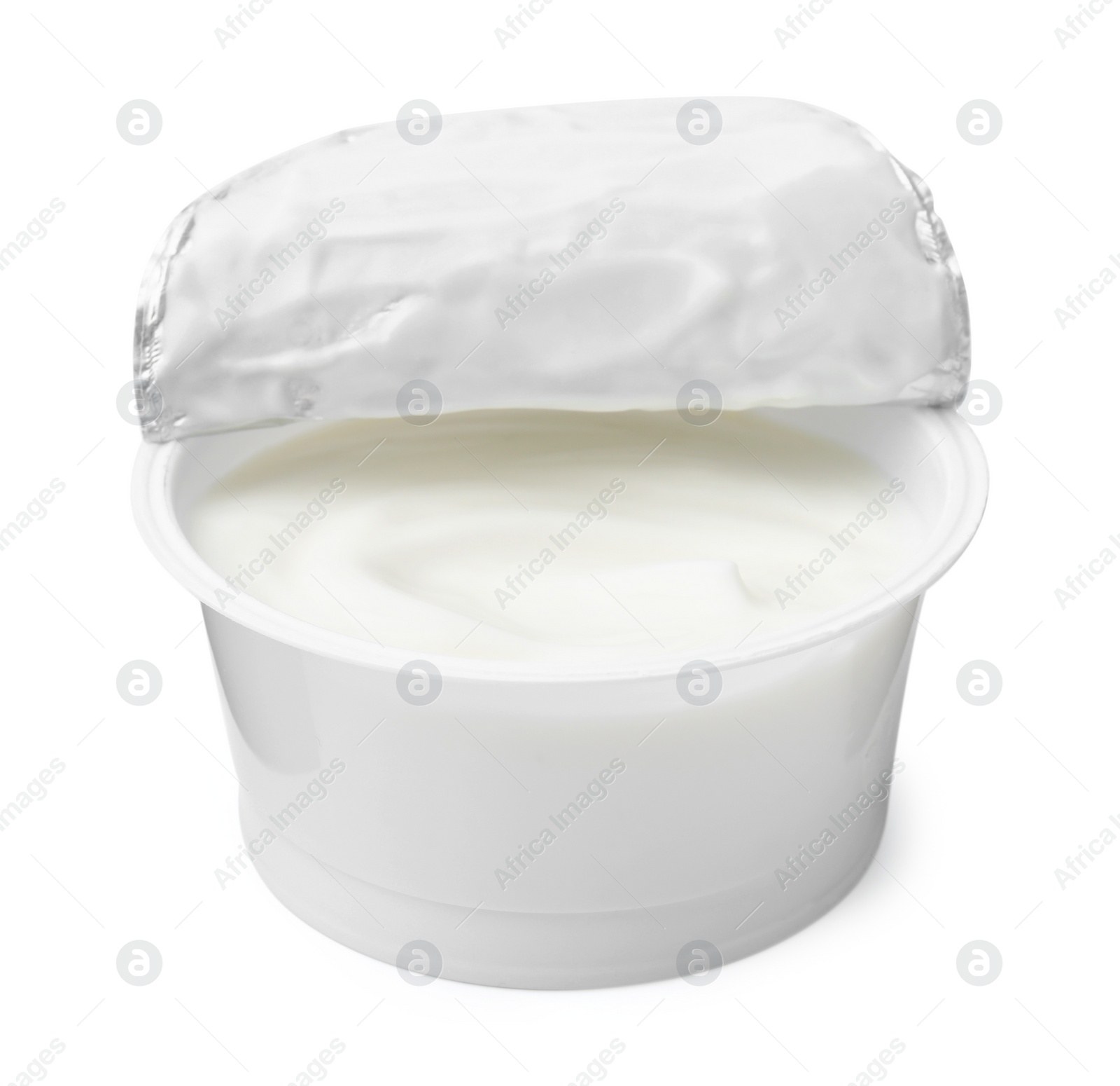 Photo of Delicious natural yogurt in plastic cup isolated on white