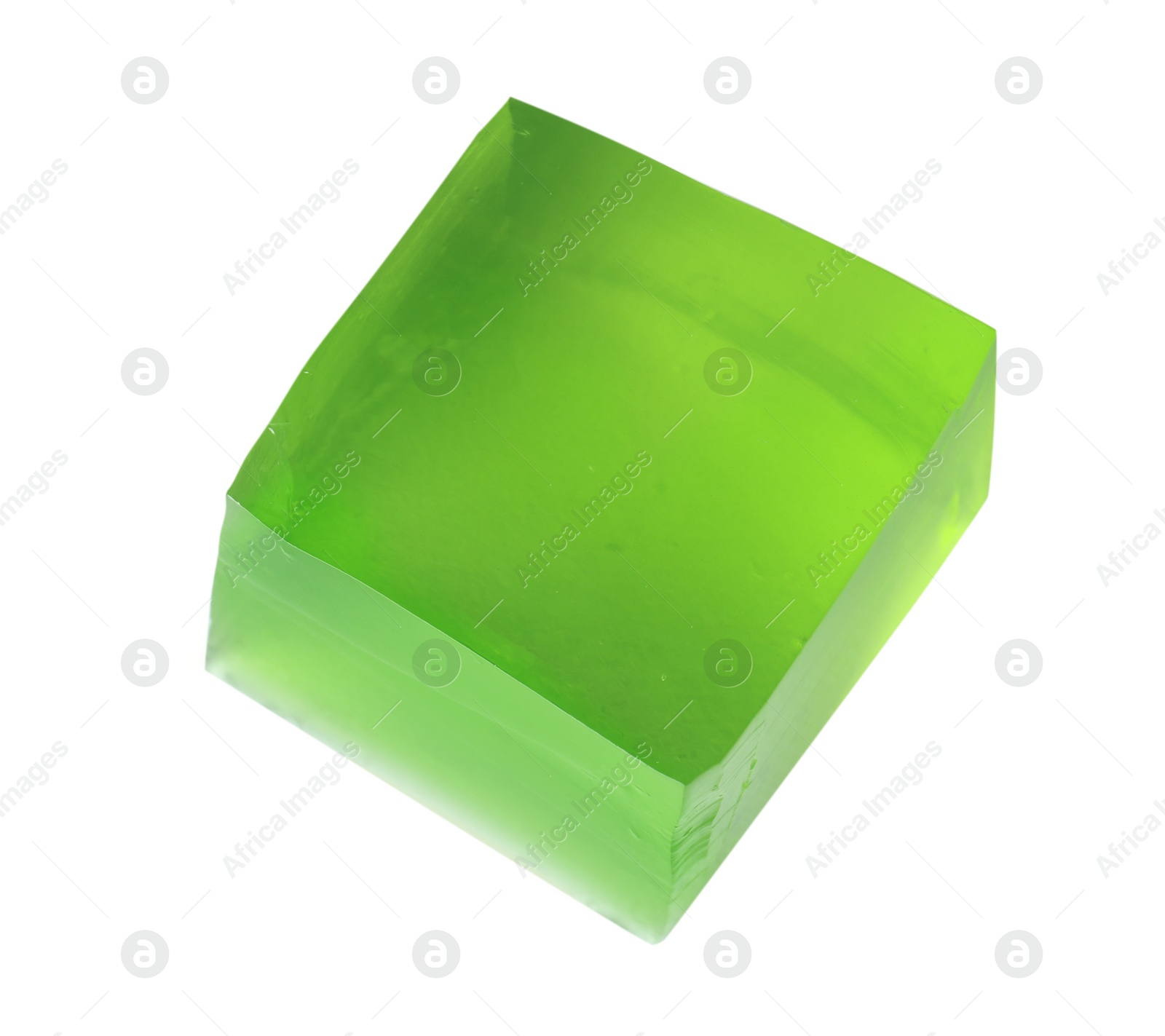 Photo of Delicious green jelly cube on white background