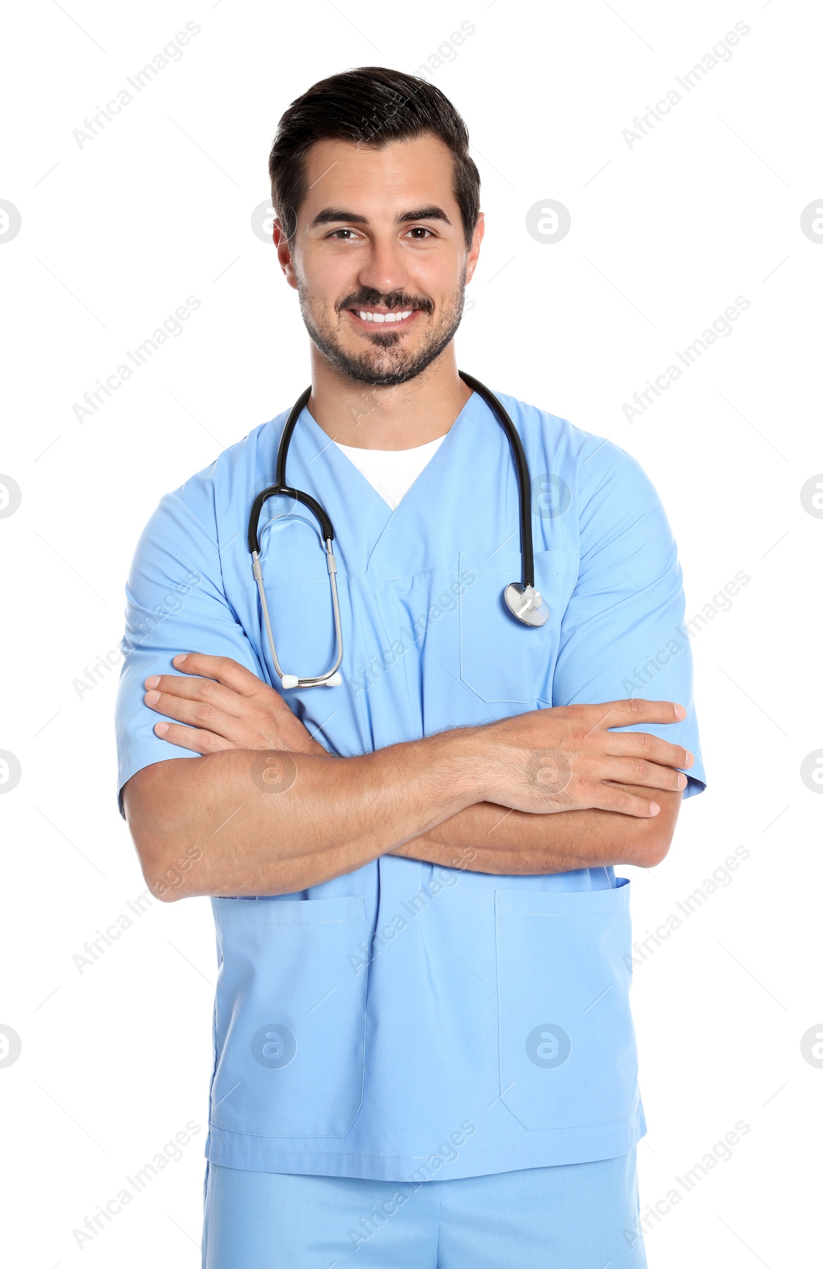 Photo of Young male doctor in uniform with stethoscope on white background. Medical service