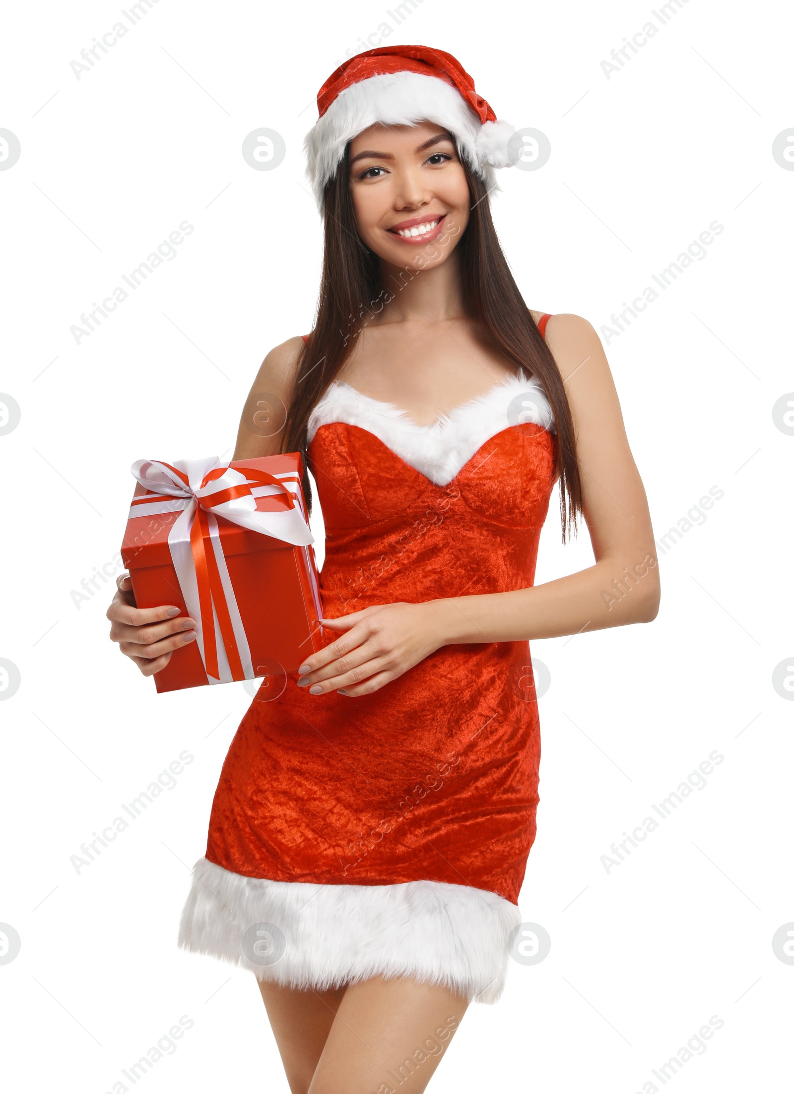 Photo of Beautiful Asian woman in Santa costume with Christmas gift on white background