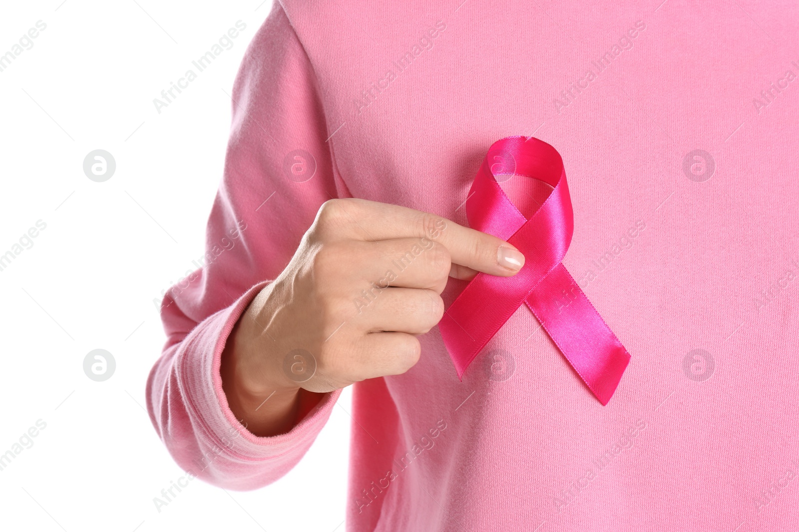 Photo of Woman holding pink ribbon on white background, closeup. Breast cancer awareness