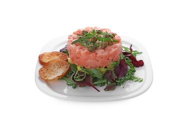 Photo of Tasty salmon tartare with avocado, greens and croutons isolated on white