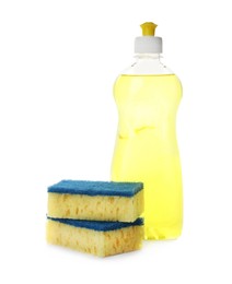 Photo of Bottle of detergent and cleaning sponges on white background