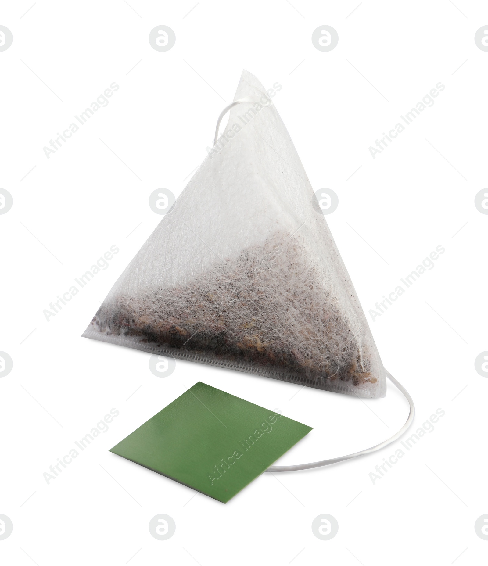 Photo of New pyramid tea bag isolated on white