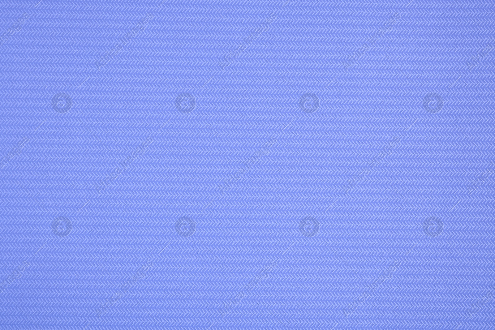 Image of Blue wallpaper sheet as background, top view
