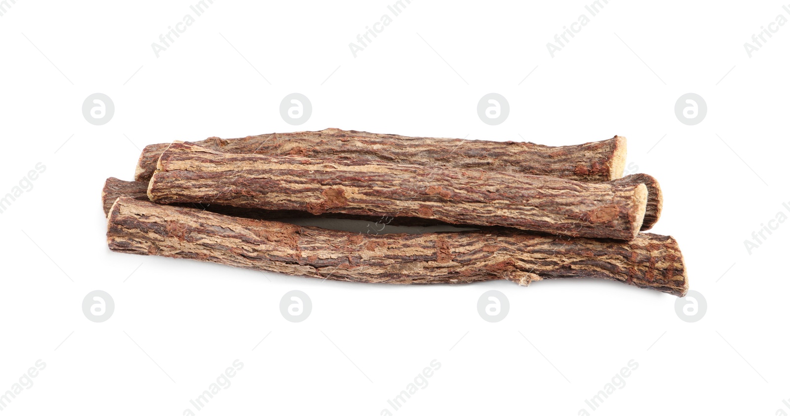 Photo of Dried sticks of liquorice root on white background