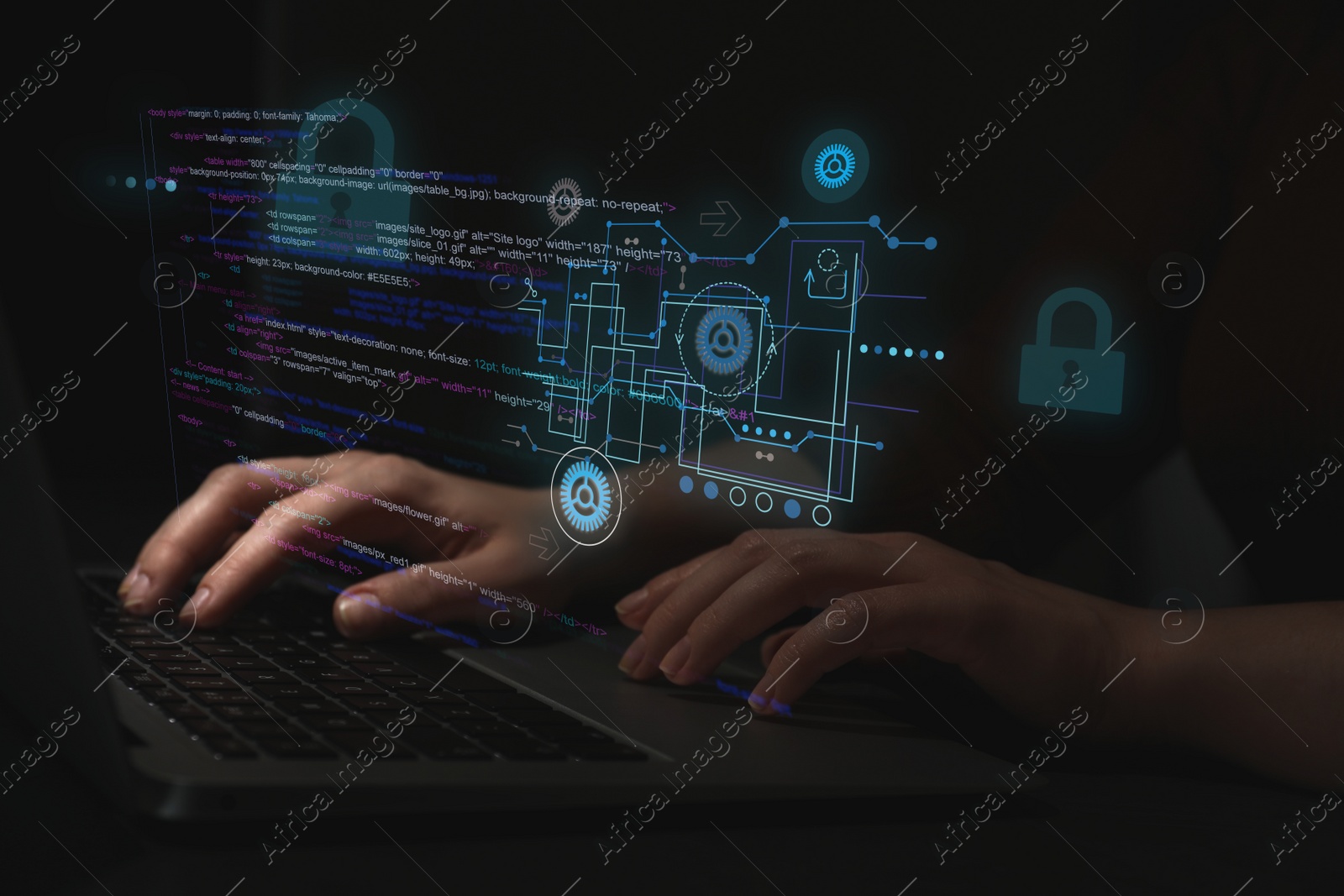 Image of Hacker working with laptop at table, closeup. Cyber attack